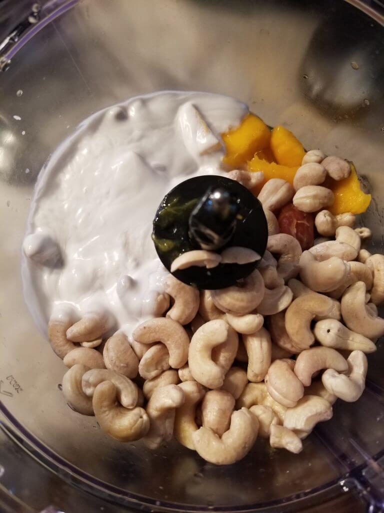 vegan cashew cheesecake filling ingredients before blending them in the food processor