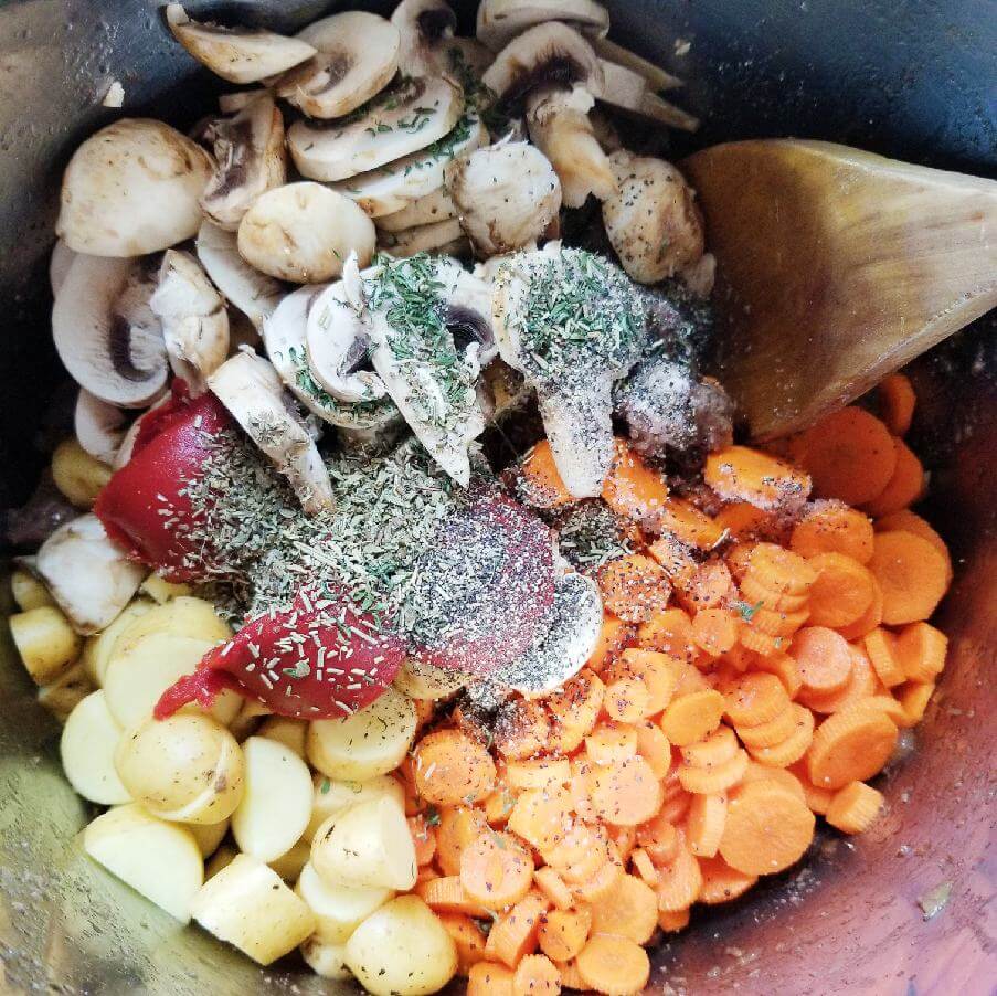 vegetables and herbs added to the instant pot