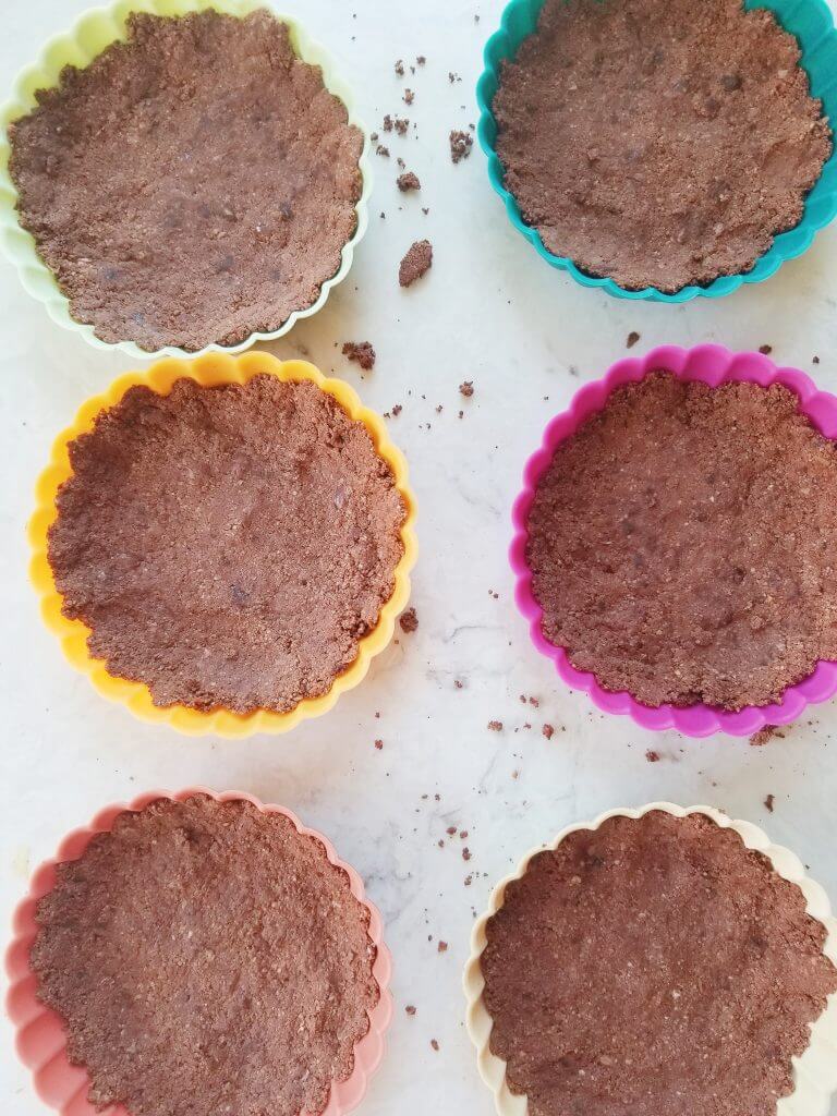 almond pulp crust in the molds