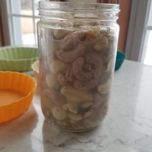soaked cashews in a mason jar
