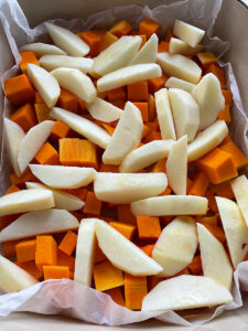 sliced apples on top of butternut squash