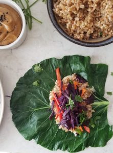 collard green wraps before they are rolled up showing the ingredients inside