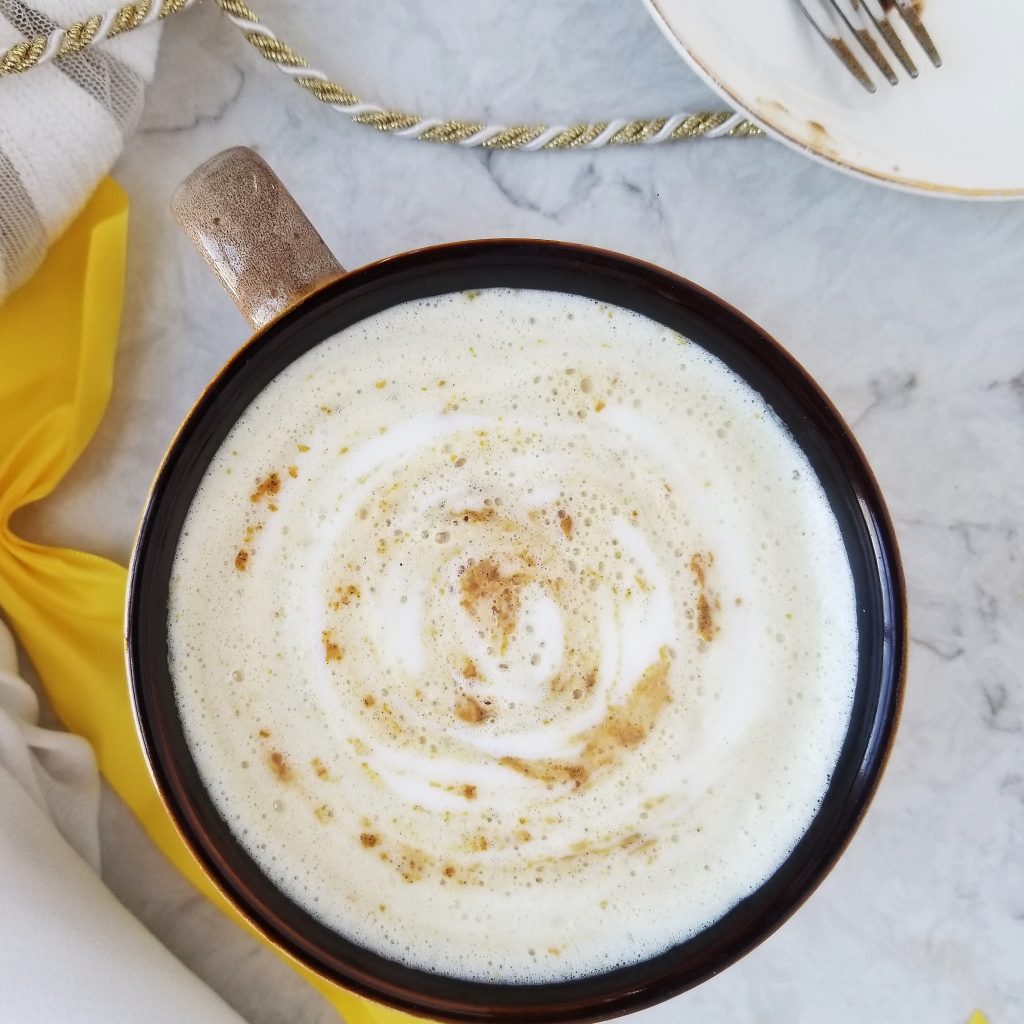 warm golden milk latte in a large mug