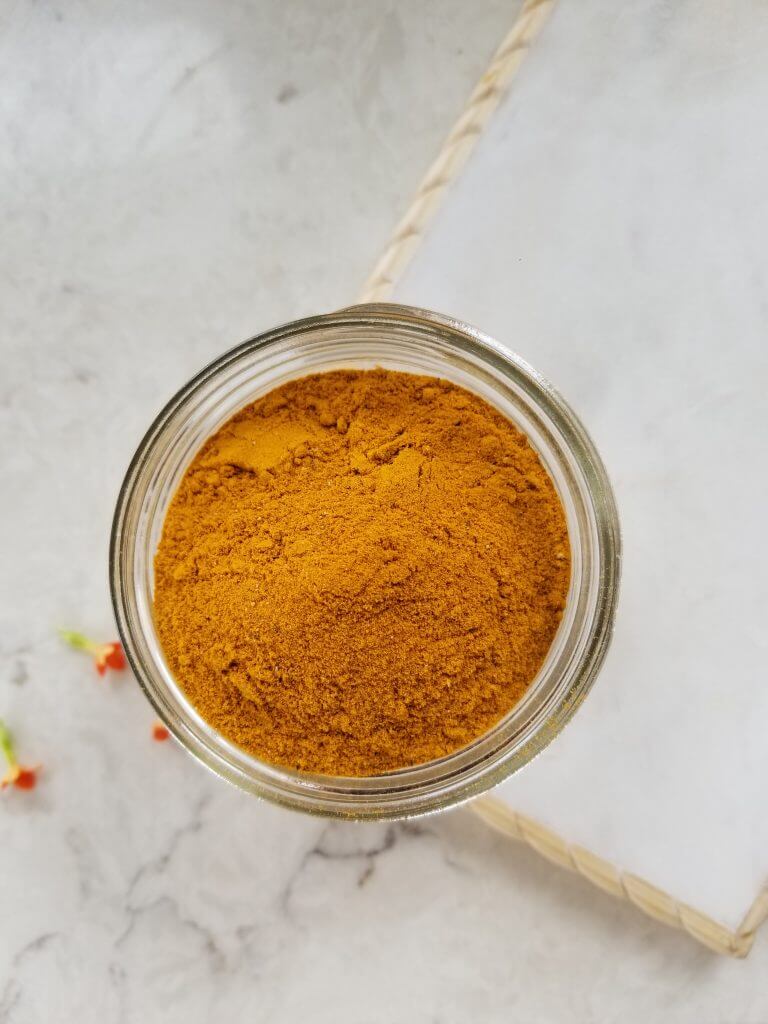 golden milk latte mix in a small mason jar
