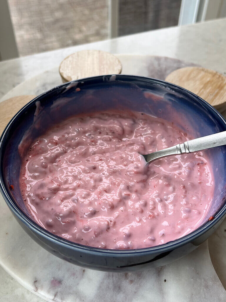 mashed raspberries in greek yogurt