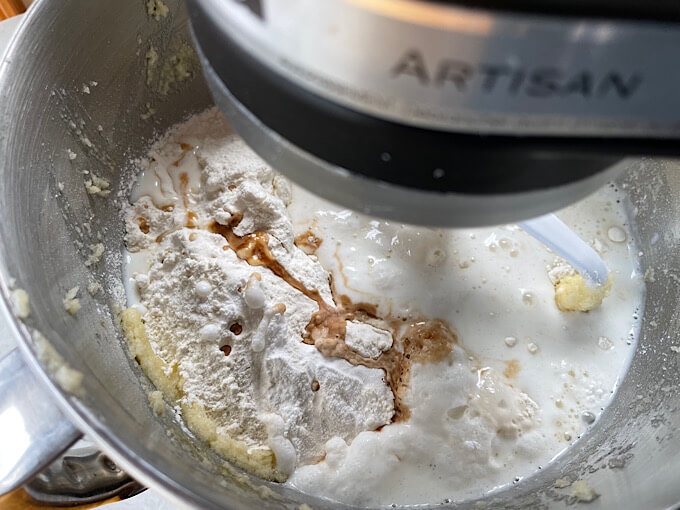 adding dry ingredients and sour milk