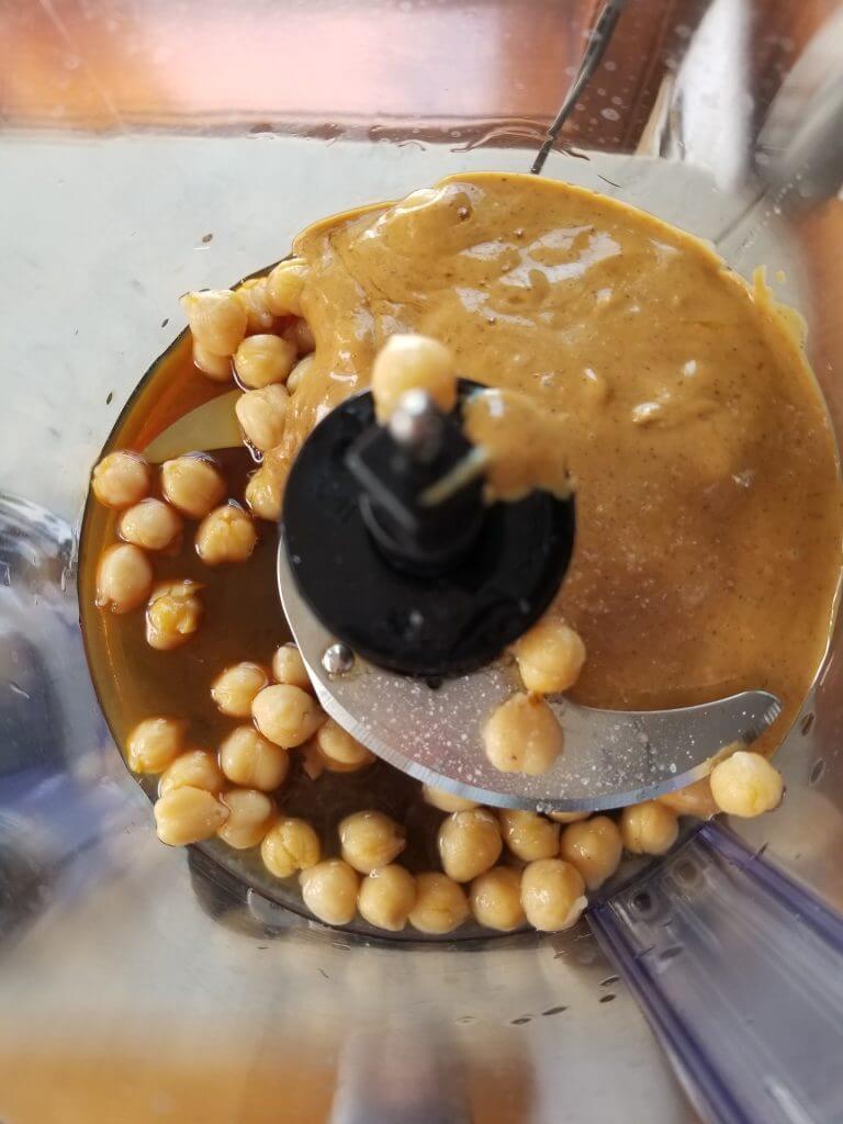 chickpeas, peanut butter, and maple syrup in a food processor