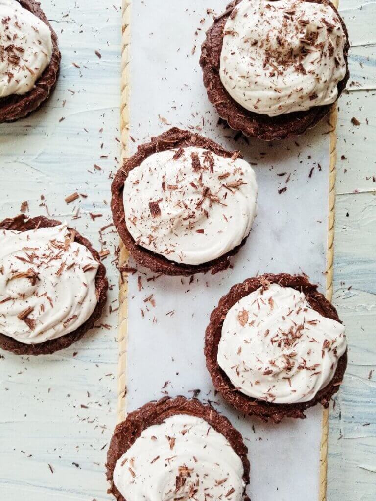 Healthy Chocolate Fudge Cashew Cheesecake with coconut milk peanut butter whip