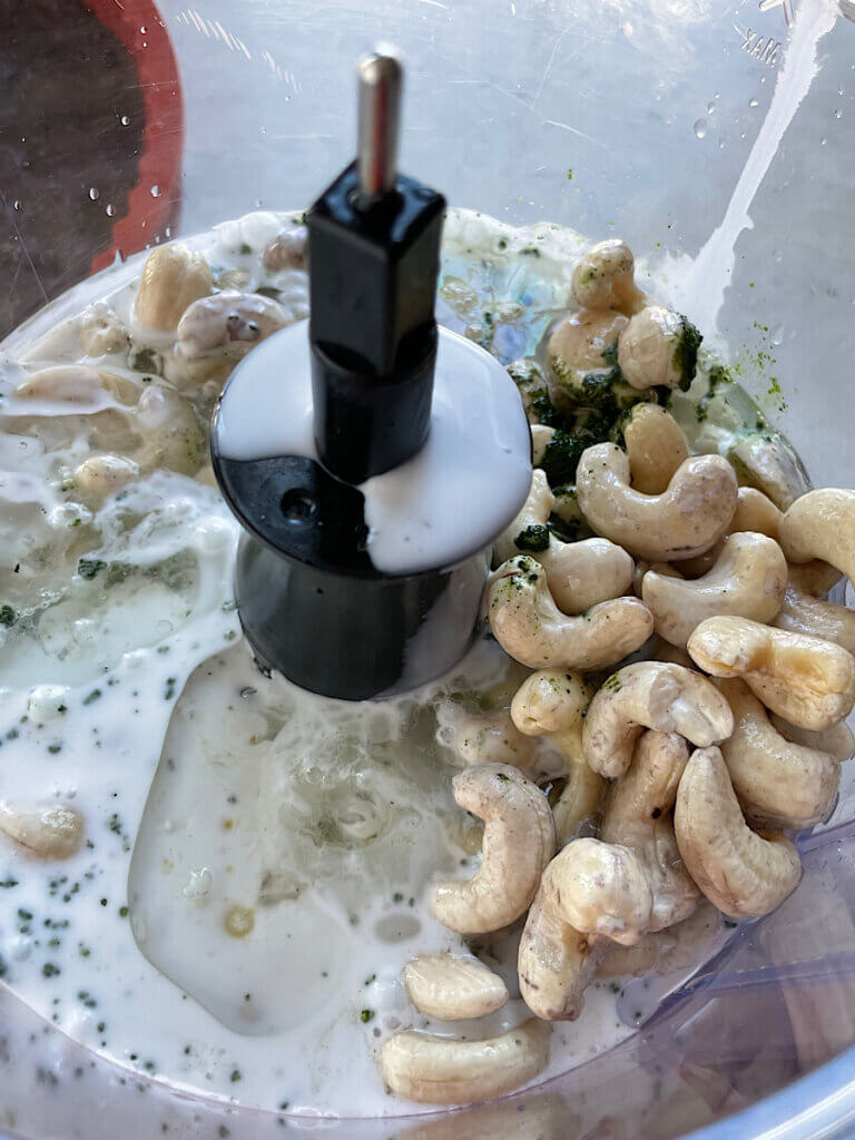 cashews, matcha, coconut milk, maple syrup, and lime juice in a food processor