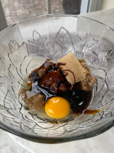 healthy molasses cookies ingredients in a mixing bowl