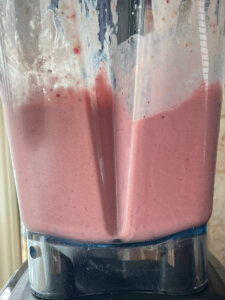 Healthy strawberry banana smoothie in vitamix