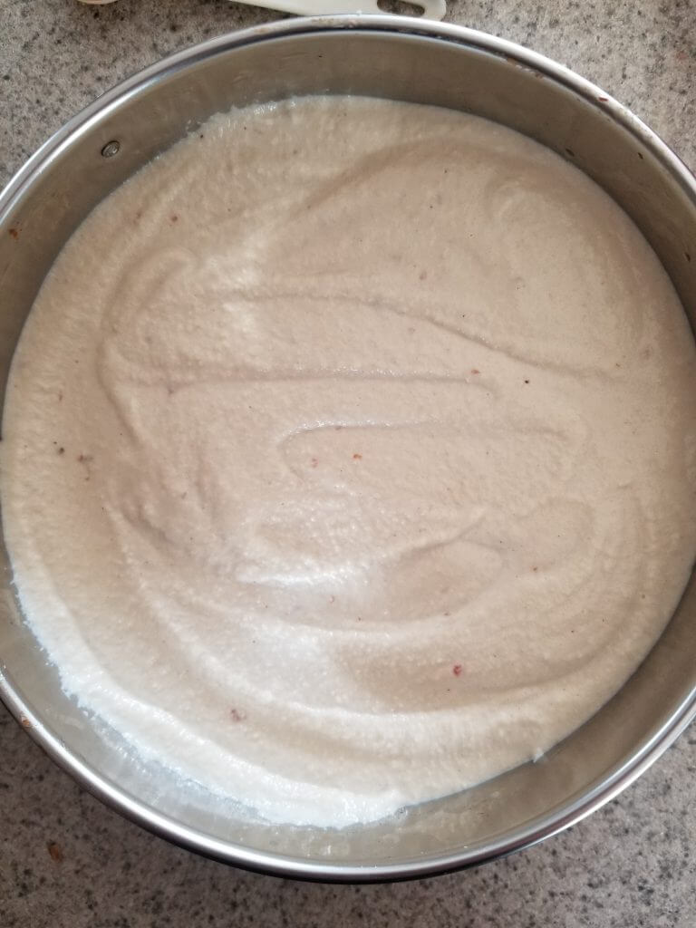 the first cashew cheesecake layer in the spring form pan
