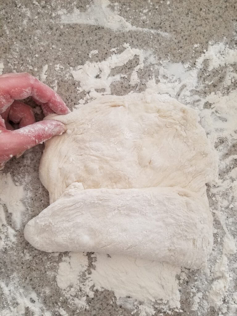 Folding the homemade ciabatta bread