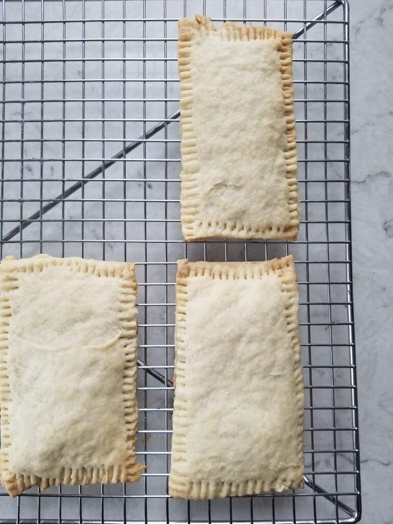 baked pop tarts on a baking rack