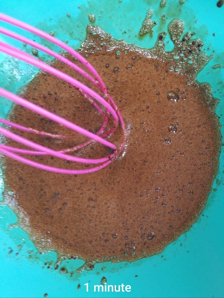 whisking the ingredients for the dalgona part of the dalgona matcha latte