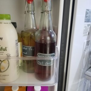 kombucha bottled in the fridge