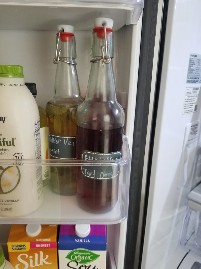 bottled kombucha in the fridge
