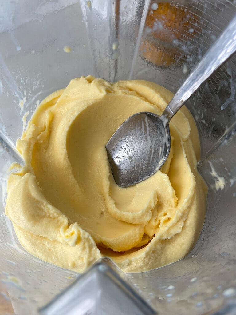 Mango pineapple smoothie in a blender
