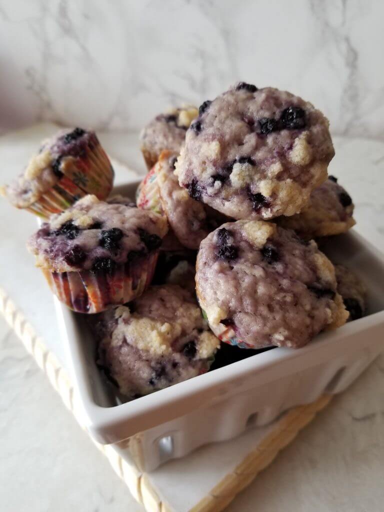mini sourdough blueberry crumble muffins after baking
