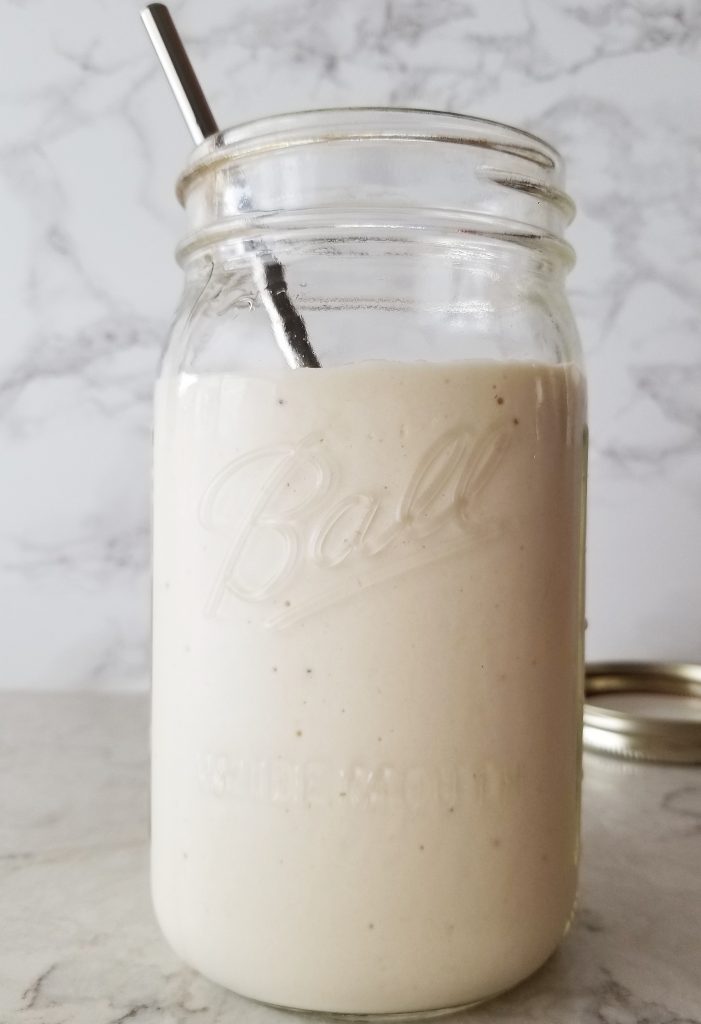pina colada mocktail in a mason jar