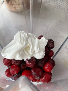 Pomegranate smoothie recipe with yogurt in a blender