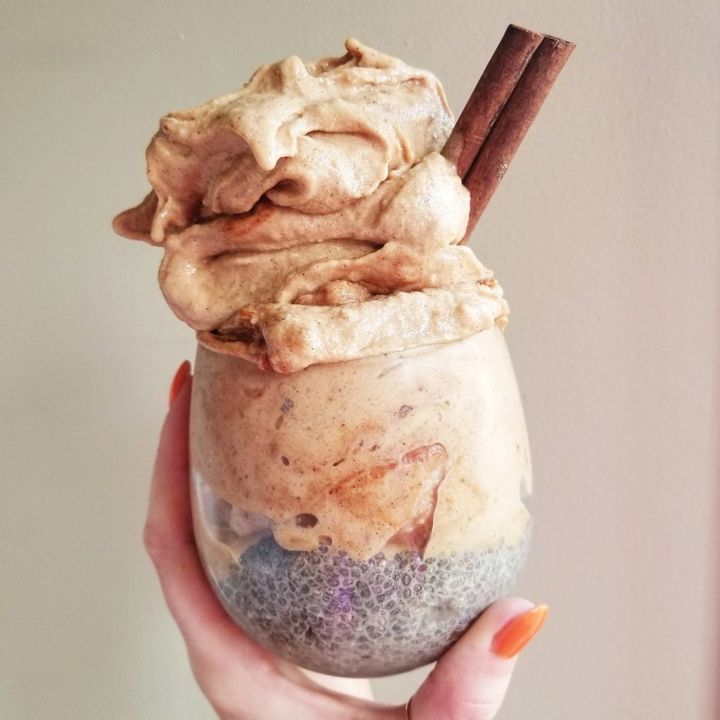 pumpkin spice smoothie jar with a cinnamon stick