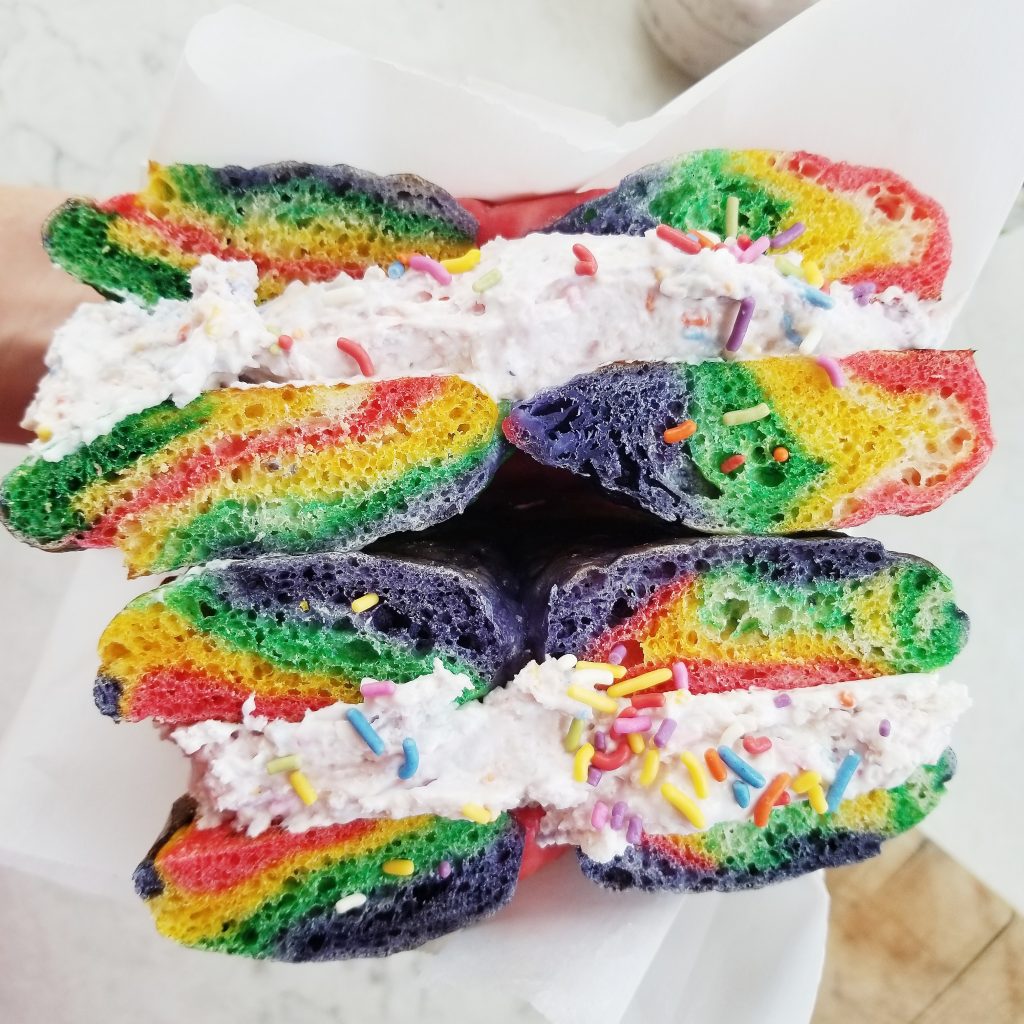 sourdough rainbow bagels with vegan funfetti