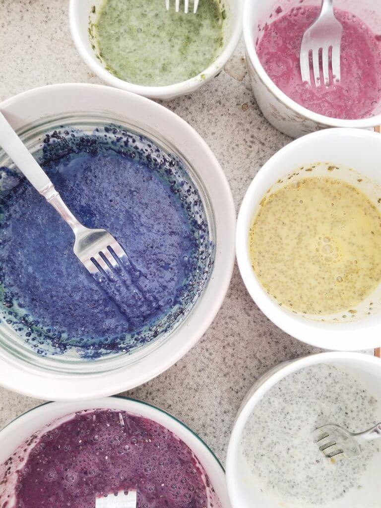 mixing the different colors into the chia seeds