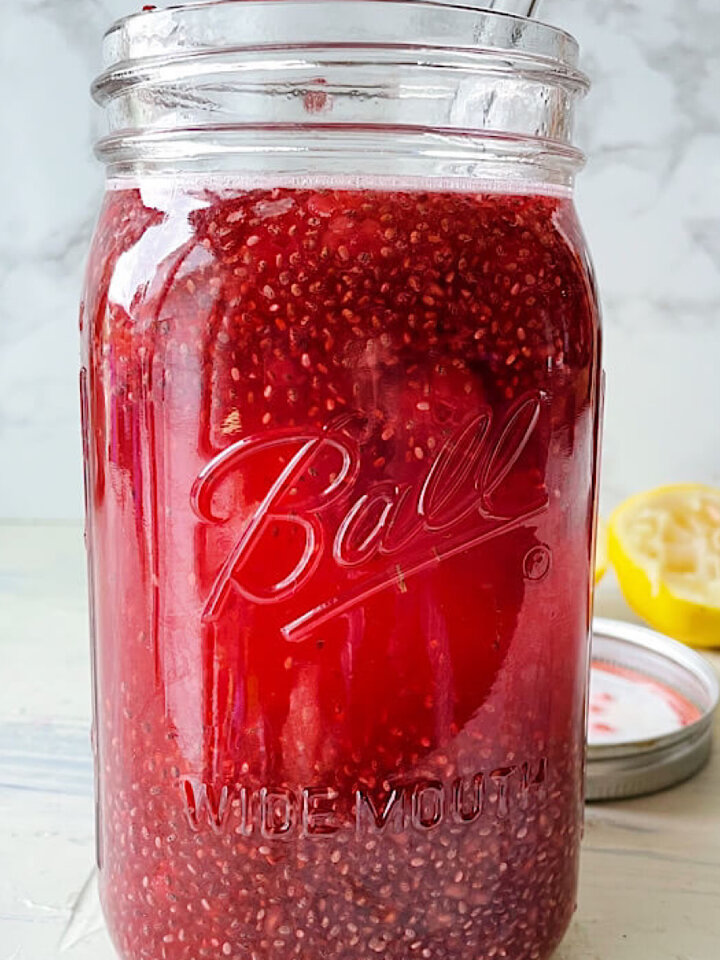 Raspberry Lemon Chia Water in a mason jar