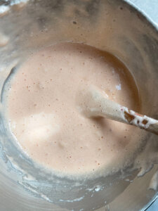 rose milk cake batter with egg whites folded in