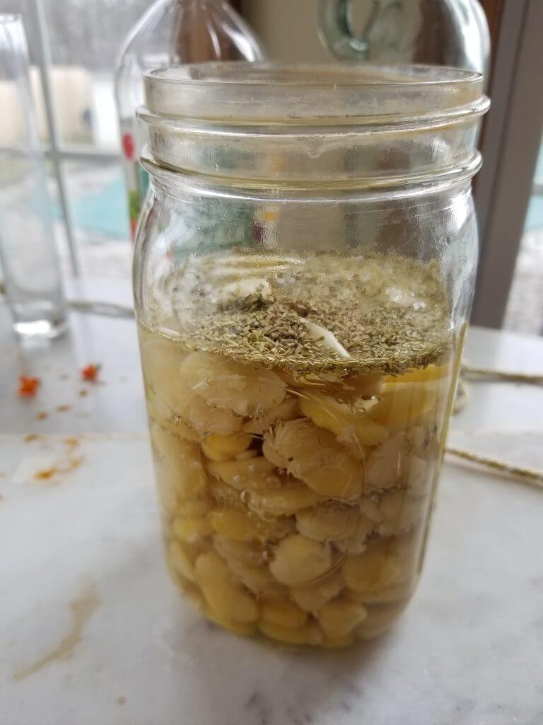 mason jar with the Marinated Fava Beans