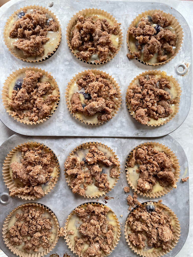 sourdough discard blueberry muffins with crumble before baking