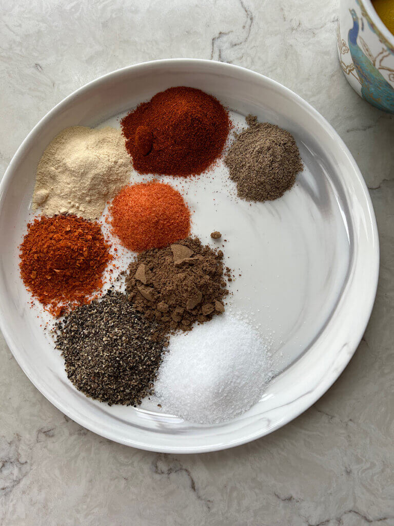 Arabic baked chicken spice blend on a plate