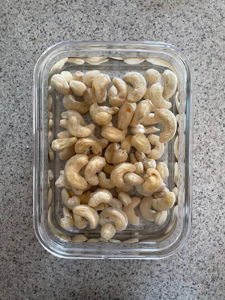 raw cashews soaked in water for vegan cheesecake