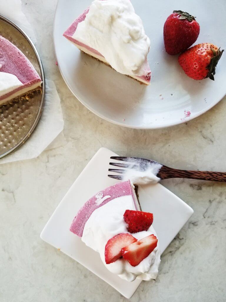 slices of vegan strawberry cashew cheesecake